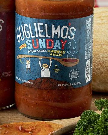 A jar of Guglielmo&rsquo;s Sunday pasta sauce with its blue label
